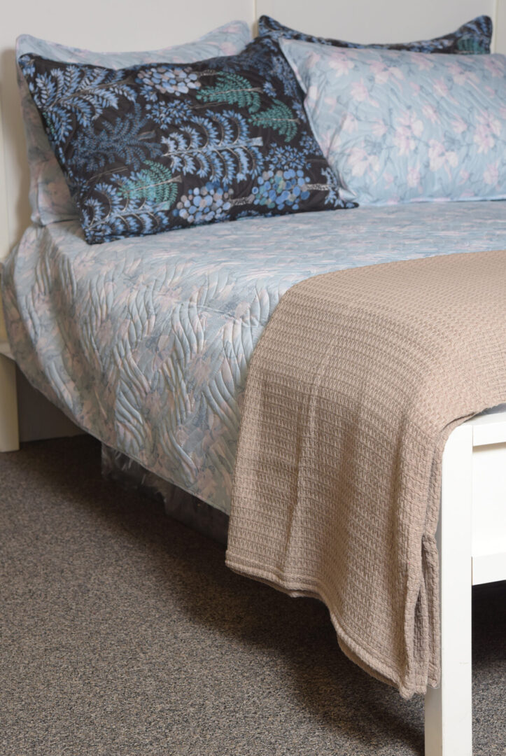 Taupe Marquis blanket placed on the bed